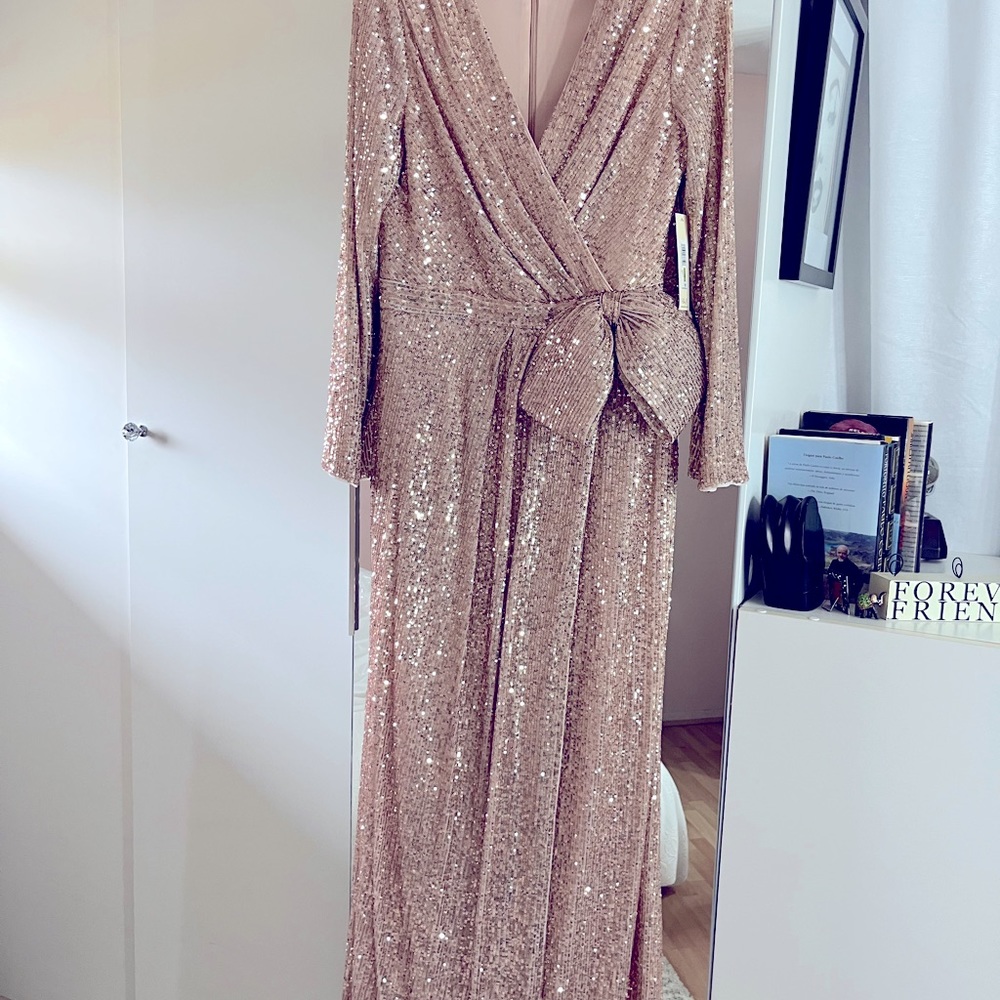 Rose sequins gown.  Never worn. Be a show stopper in this amazing gown.